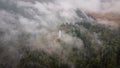 Rising mist surrounds the Mahlberg tower in the northern Black Forest