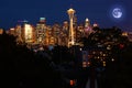 Rising moon above Seattle, Washington Royalty Free Stock Photo