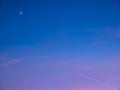 Rising Moon with North StarPolaris with the reds on the horizon and plane