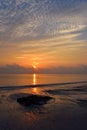 Rising Sun with Golden Reflection in Sea Water with Pattern of Clouds in Sky - Kalapathar Beach, Havelock Island, Andaman Royalty Free Stock Photo