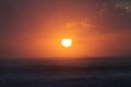 Rising sun over the Mediterranean sea. orange Cloudy dusk sky and rising sun over water. Beautiful sunshine, stunning sunrise, cal Royalty Free Stock Photo