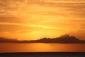 Rising sun over the Mediterranean sea. orange Cloudy dusk sky and rising sun over water. Beautiful sunshine, stunning sunrise, cal Royalty Free Stock Photo