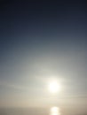 Rising sun over sea with early winter clouds Royalty Free Stock Photo