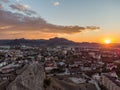 Rising sun over Sudak, black sea coast Royalty Free Stock Photo