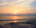 Rising Sun with Reflection in Ocean Water at Kalapathar Beach, Havelock Island, Andaman with Bright Colors in Sky Royalty Free Stock Photo