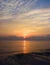 Rising Sun with Reflection in Ocean Water at Kalapathar Beach, Havelock Island, Andaman with Bright Colors in Sky Royalty Free Stock Photo