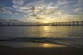 The rising sun reflects warmth on calm waters in Coronado Bay, San Diego, California