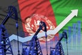 Rising up chart on Afghanistan flag background - industrial illustration of Afghanistan oil industry or market concept. 3D Illustr