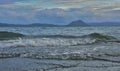 Rising water at Taal Lake with the Taal Volcano as backdrop Royalty Free Stock Photo