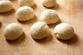 Rising yeast dough on cutting board