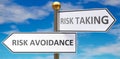 Risk avoidance and risk taking as different choices in life - pictured as words Risk avoidance, risk taking on road signs pointing