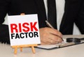 Risk factor and stethoscope. Medecine concept. Blackboard with word risk factor and stethoscope