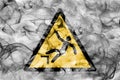 Risk of falling hazard warning smoke sign. Triangular warning ha Royalty Free Stock Photo