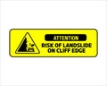 Risk of landslide on cliff edge sign
