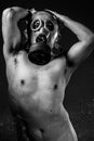 Risk, A man in a gas mask in the smoke. artistic background Royalty Free Stock Photo