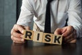 Risk management concept is shown using the text on the wooden cubes Royalty Free Stock Photo