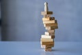 risk management concepts Hands trying to protect the crumbling wooden blocks block tower businessman