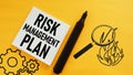 Risk management plan is shown using the text Royalty Free Stock Photo