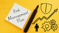 Risk management plan is shown using the text Royalty Free Stock Photo