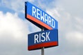 Risk and reward - street sign, sky in background