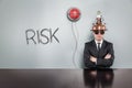 Risk text with alert light and vintage businessman