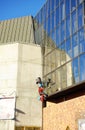 Window cleaners working in an office building Royalty Free Stock Photo