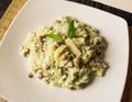 Risotto with mint and salami