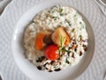 Risotto with seafood, cherry tomatoes and balsamic vinegar
