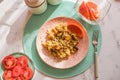 Risotto with seafood in pink bowl . Italian rice porridge with seafood close up. Traditional food with tomato Royalty Free Stock Photo