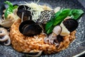 Risotto with seafood shrimp and mussels in shells. Mediterranean cuisine. Restaurant menu, dieting, cookbook recipe top view