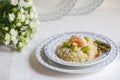 Risotto with shrimp and asparagus dish is ready to serve Royalty Free Stock Photo