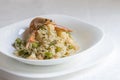 Risotto with shrimps and asparagus, white background Royalty Free Stock Photo