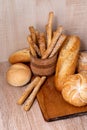 ÃÂ¡risp bread with buns. French baguettes. Fresh crispbread. Bread background. Different breed on wooden background