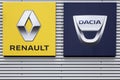 Renault and Dacia logos on a wall
