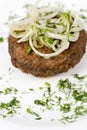 Rissole with onion rings, macro Royalty Free Stock Photo
