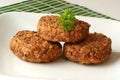 Rissole with parsley on a plate