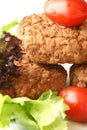 Rissole with plum tomato and salad Royalty Free Stock Photo