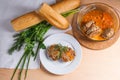 Rissole of pork served on a white plate with white wheat bread a Royalty Free Stock Photo