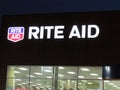 Rite aid lighted sign in Edison on Rt 1 at late evening, NJ USA.