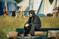 RITTER WEG, MOROZOVO, APRIL 2017: Festival of the European Middle Ages. Monks in long black cape cloak with hood on