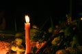 Ritual candles flanking with incense,lotus and other flowers