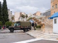 The ritual of changing the guard of Greek Evzonian Guards at the grave of the Unknown Soldier on Syntagma Square in rainy weather