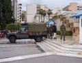 The ritual of changing the guard of Greek Evzonian Guards at the grave of the Unknown Soldier on Syntagma Square in rainy weather