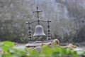 Ritual hand bell on sand as the enlightenment symbol. religious thing