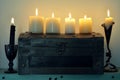 Ritual wooden box with burning candles