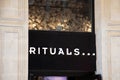 rituals logo brand and text sign on wall facade storefront fashion business