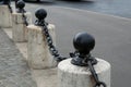 Granite curb posts, with cast iron balls and chains