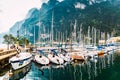 Riva del Garda, Italy - October 2, 2021: Boats and yachts moored in the port of Riva on the Italian lake Royalty Free Stock Photo