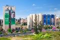 Rival parties billboards on the buildings along a highway road i Royalty Free Stock Photo