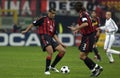 Rivaldo and Paolo Maldini in action during the match